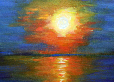 Card with sunset over water with a warm glow reflecting on the water's surface