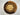 Assorted cookies arranged in a circular pattern on a marble surface