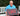 Man holding a sign with 'LOVE' outdoors