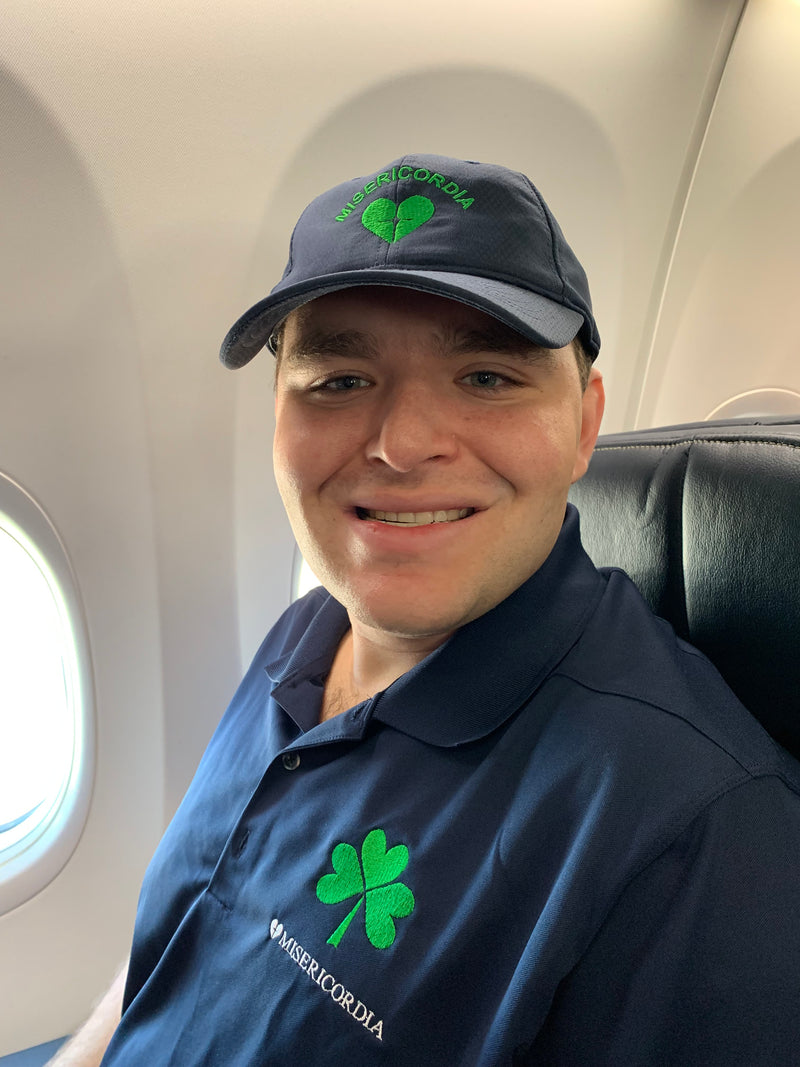Man smiling on a plane