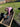Person working with soil in a raised garden bed outdoors
