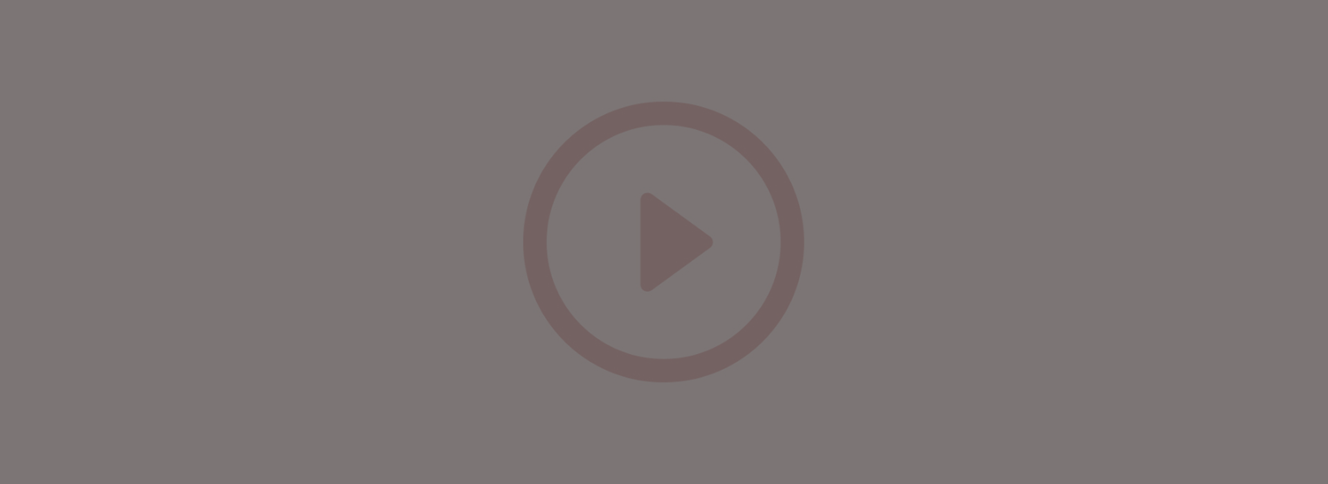 Play button icon on a gray background