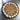 Large cookie cake with white frosting, colorful sprinkles, and a message 'Your Message Here!!' on a metallic surface.